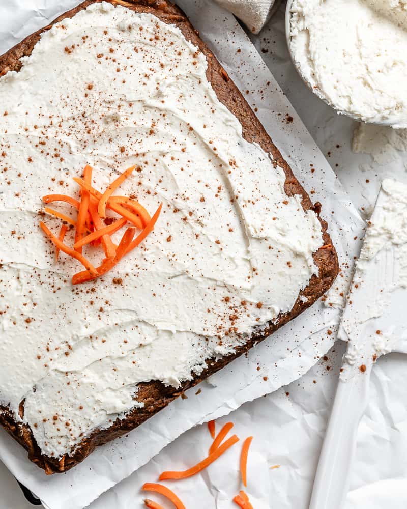 completed Vegan Carrot Cake on a white surface