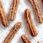 close up on cinnamon sugar-coated vegan churros.