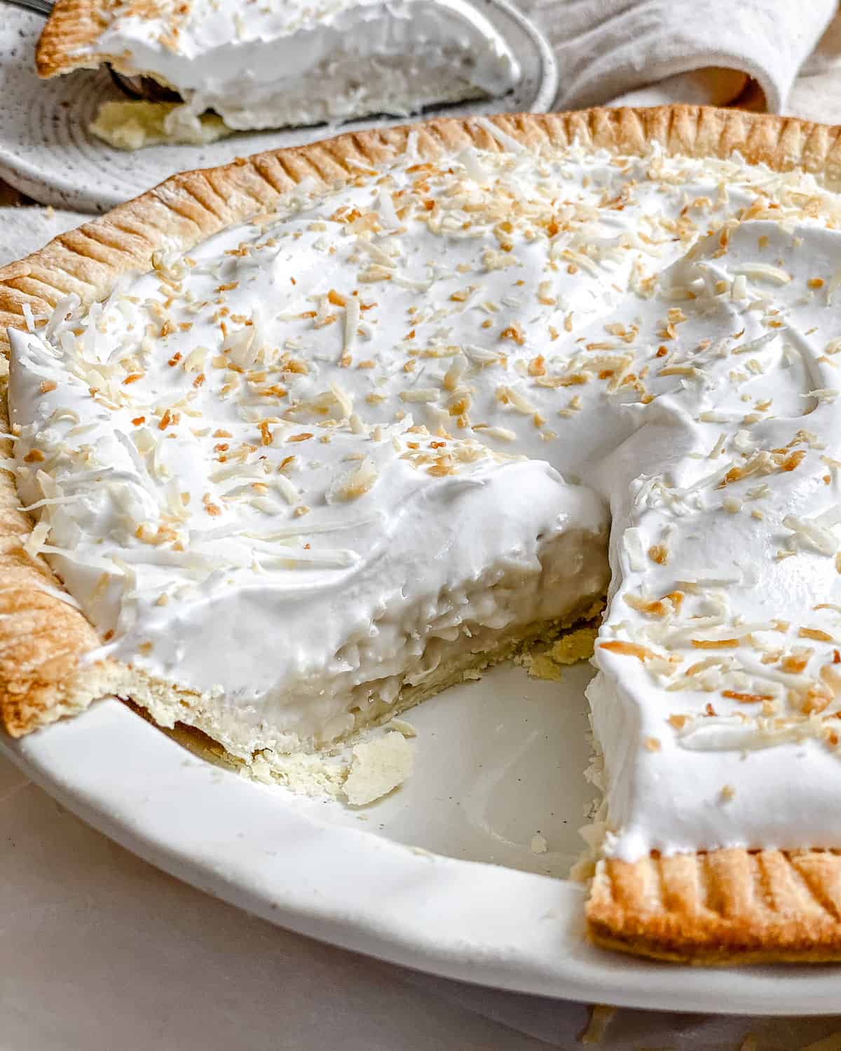 completed Vegan Coconut Cream Pie against a white background