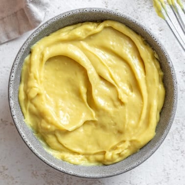 yellow vegan custard in a bowl.