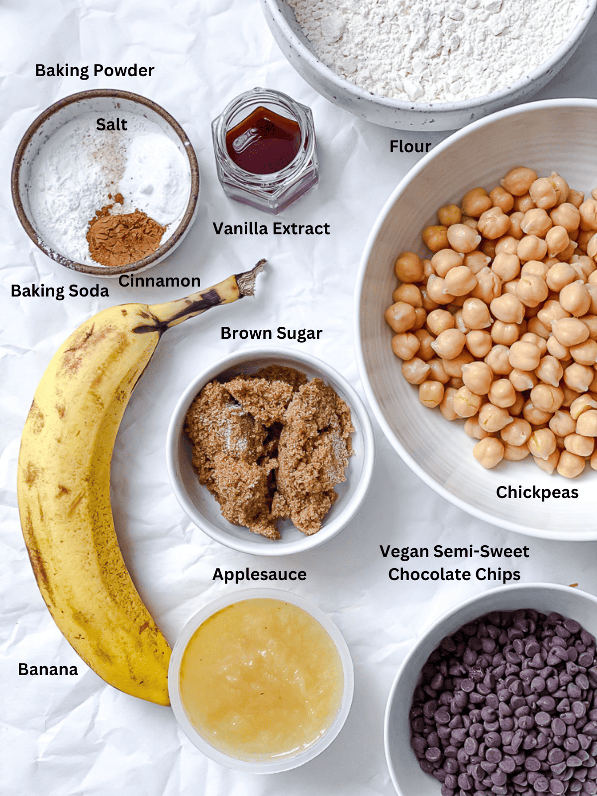 ingredients for Chickpea Chocolate Chip Cookies on a white surface