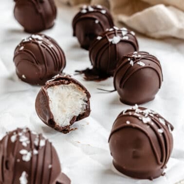 completed 3-Ingredient Chocolate Coconut Balls on a white surface