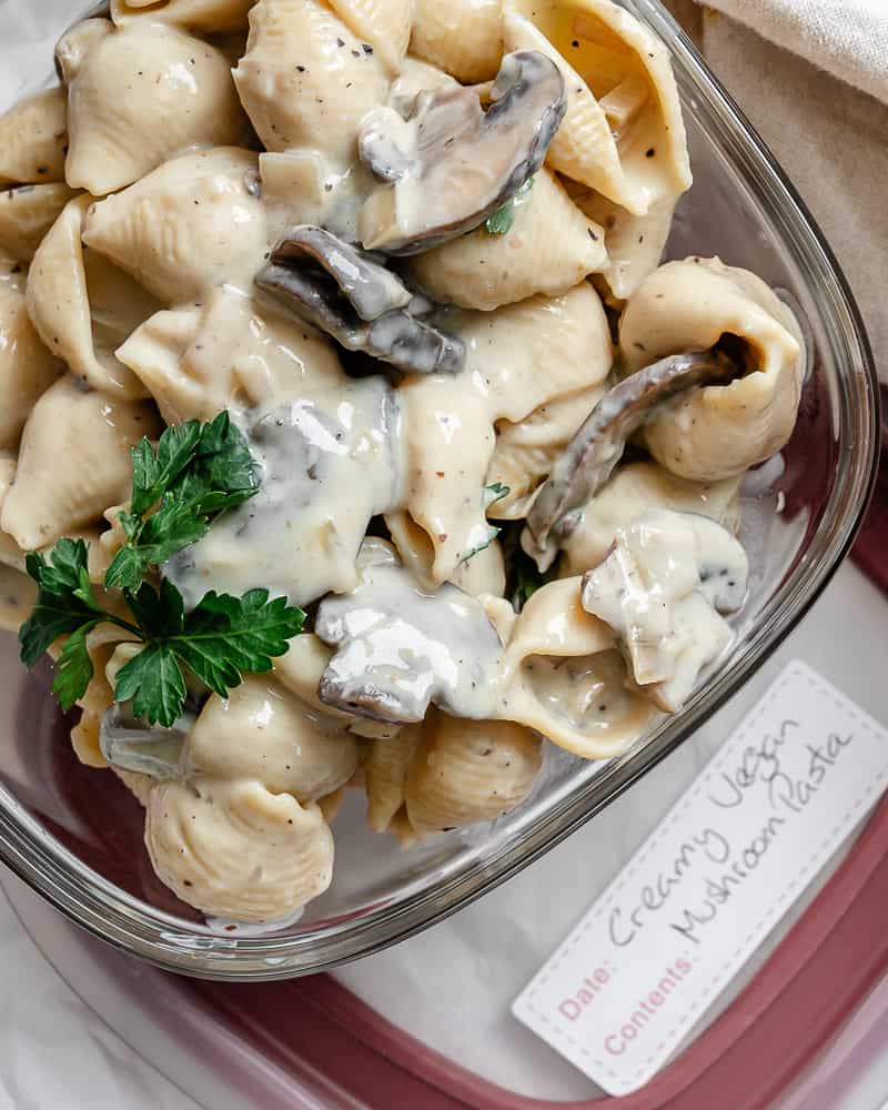completed Creamy Vegan Mushroom Pasta in a storage container