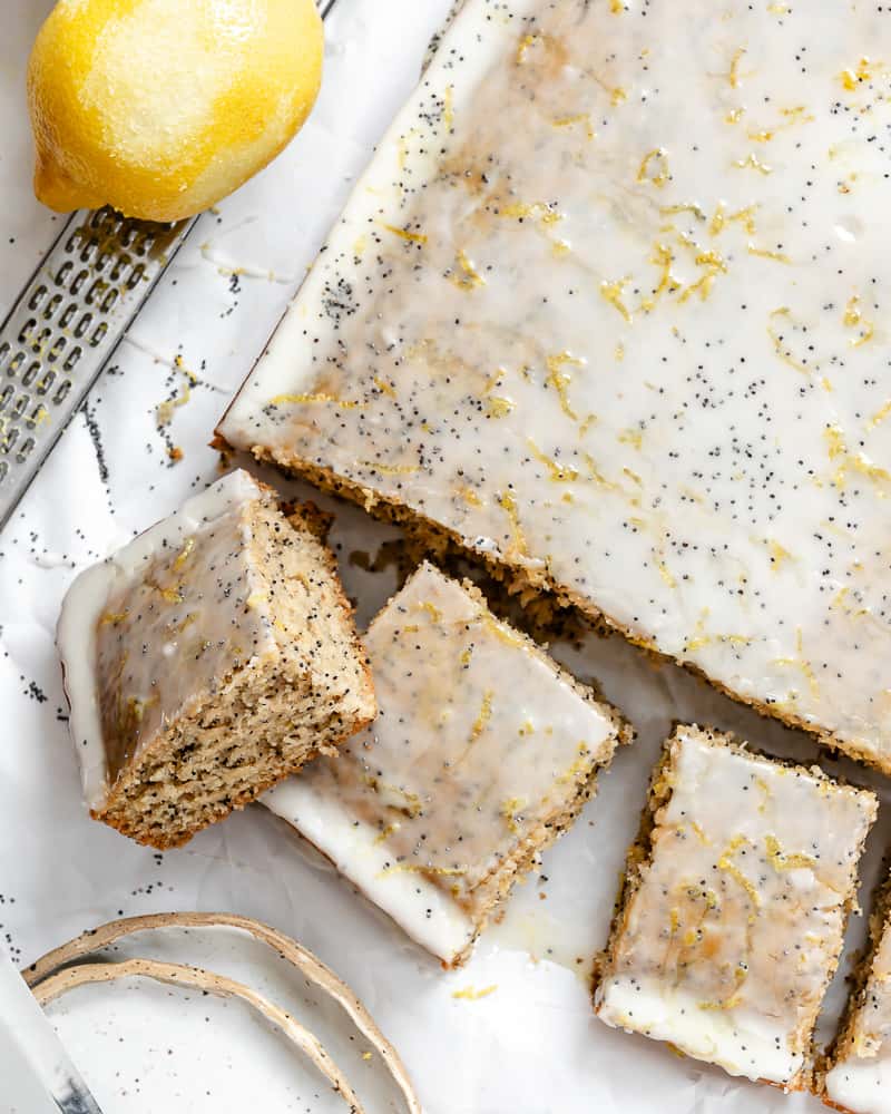 overhead view of a sliced lemon poppy seed cake.