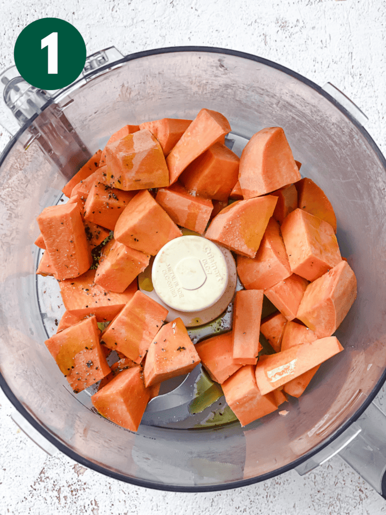 process shot showing sweet potatoes in a food processor