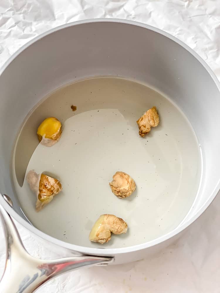 process shot showing ginger in pot
