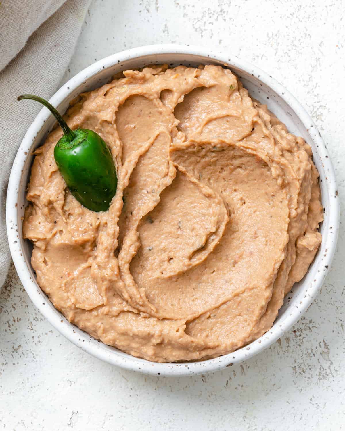 completed Mexican Pinto Bean Dip in a bowl