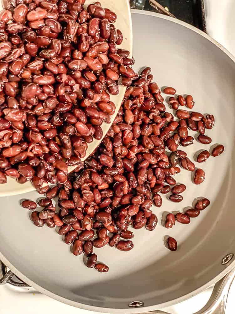 process shot showing beans cooking in pot