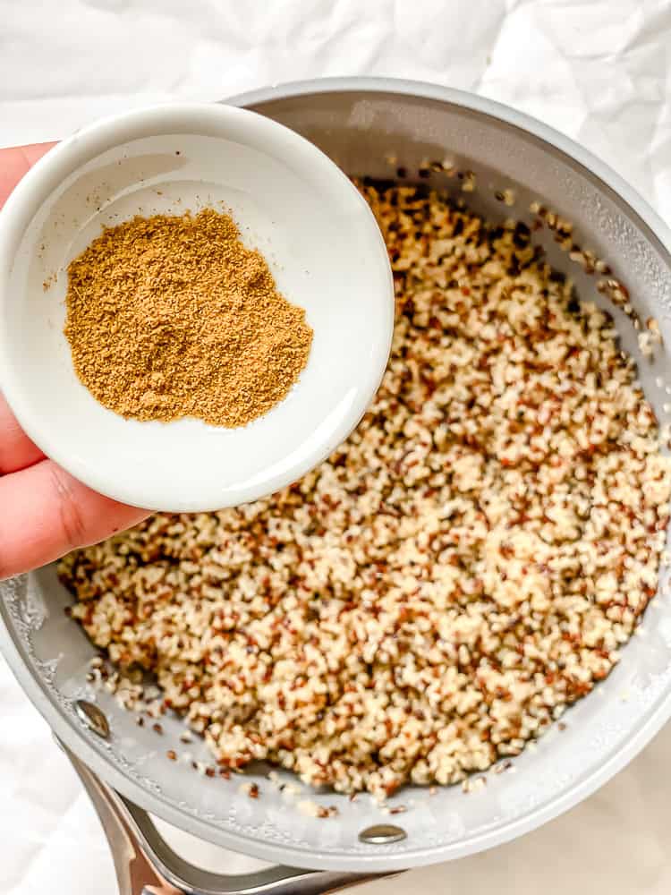 process shot showing adding seasoning to pot