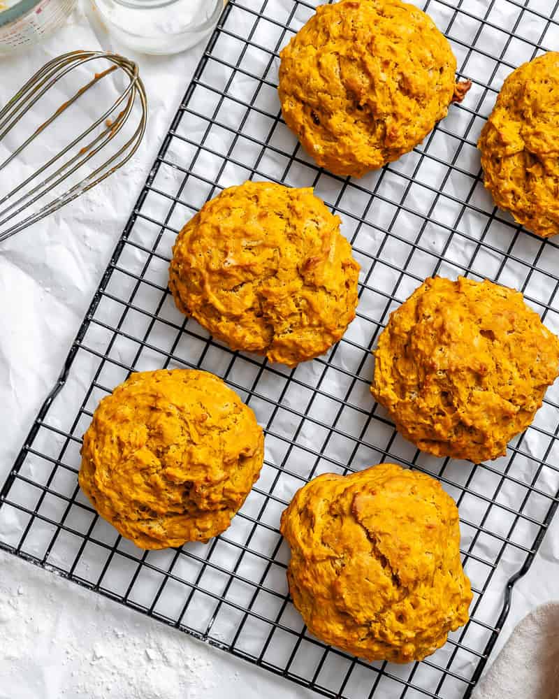 baked sweet potato biscuits on a wire rack.