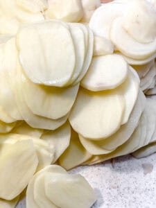 close up on sliced potatoes.