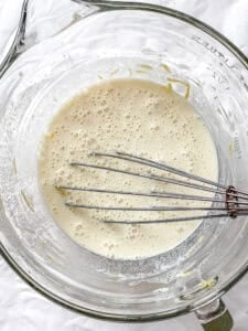 process shot showing whisking ingredients in bowl
