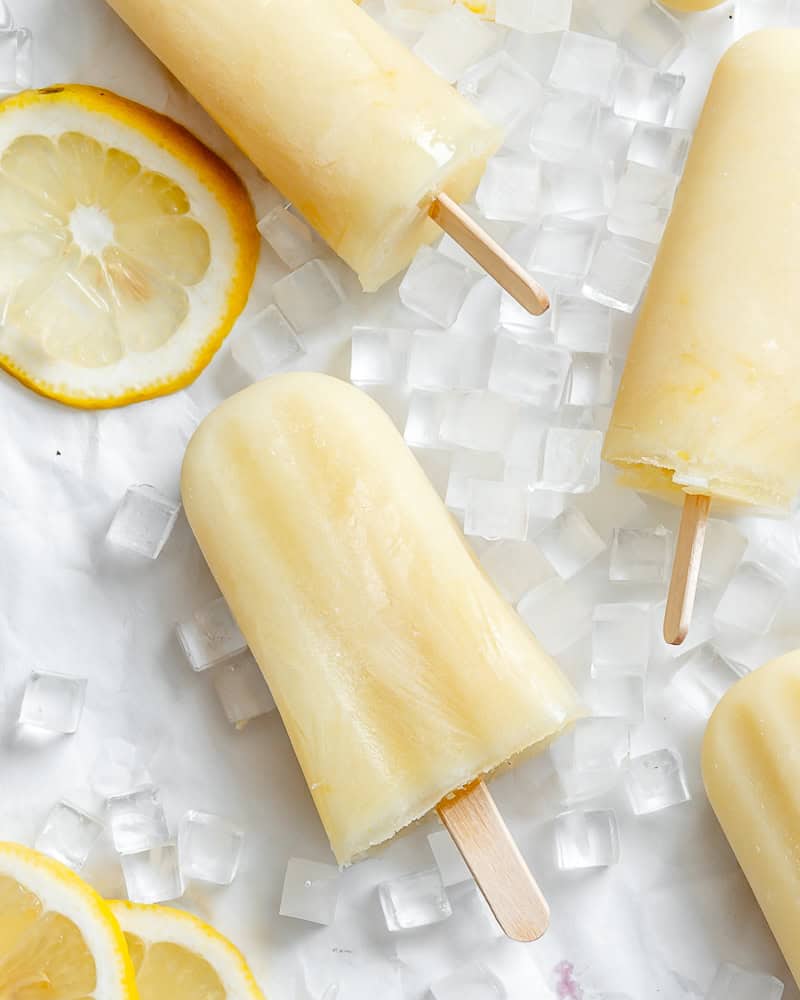 completed Easy Lemon Popsicles on white surface