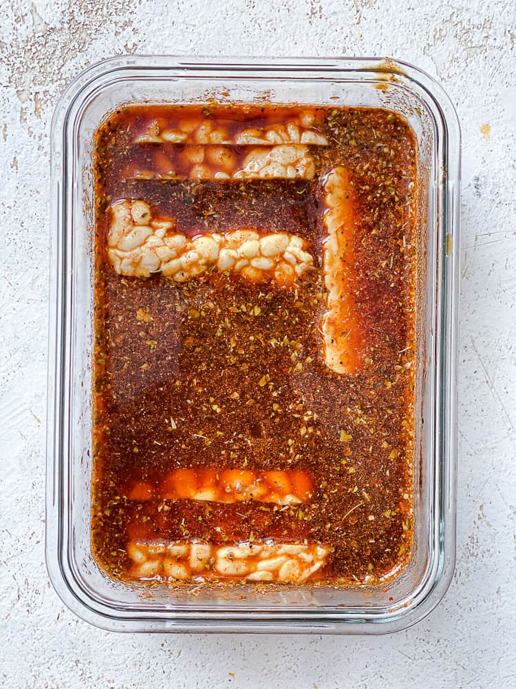 process shot showing marinade in container
