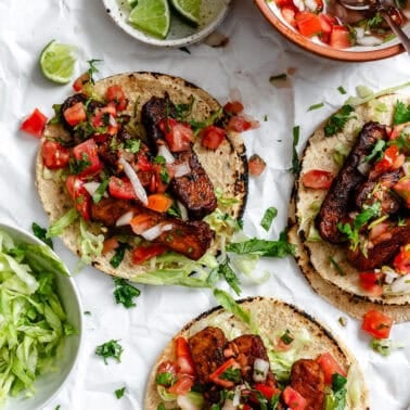 completed Easy Tempeh Tacos on a white surface