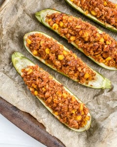 process shot showing filling added to zucchin boats