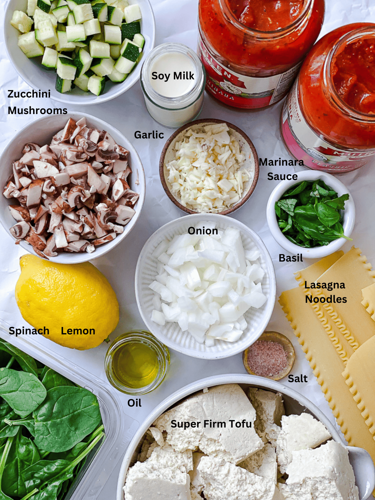 ingredients for Vegan Lasagna on white surface