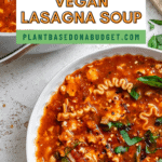 Pinterest image of vegan lasagna soup in a white bowl.