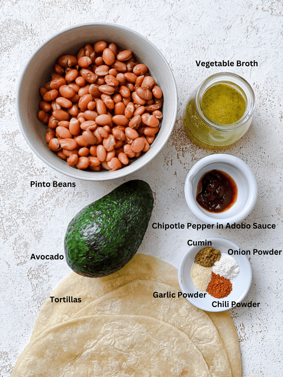 ingredients for Vegan Bean Quesadilla measured out on a white surface
