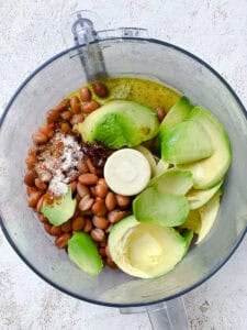 ingredients for vegan bean quesadillas in a food processor.