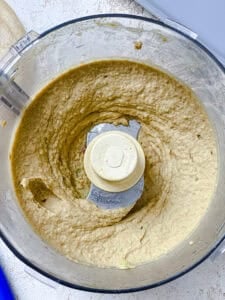 a blended pinto bean and avocado puree in a food processor.