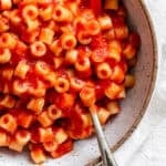 completed Quick Homemade SpaghettiOs plated against a white surface