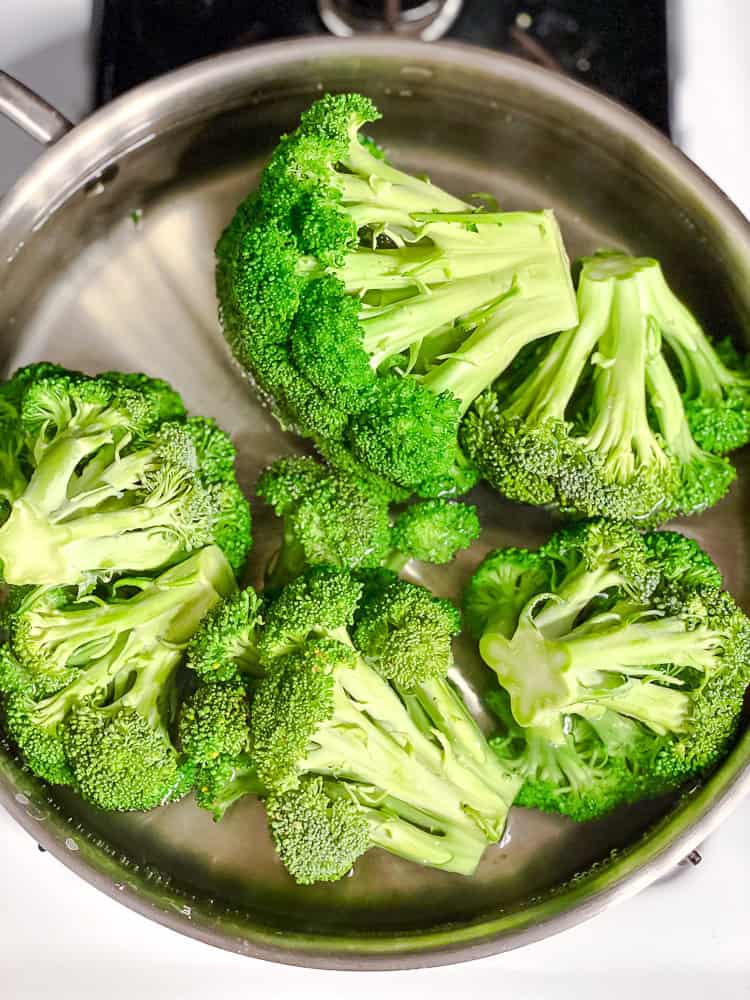 process shot showing broccoli in pot