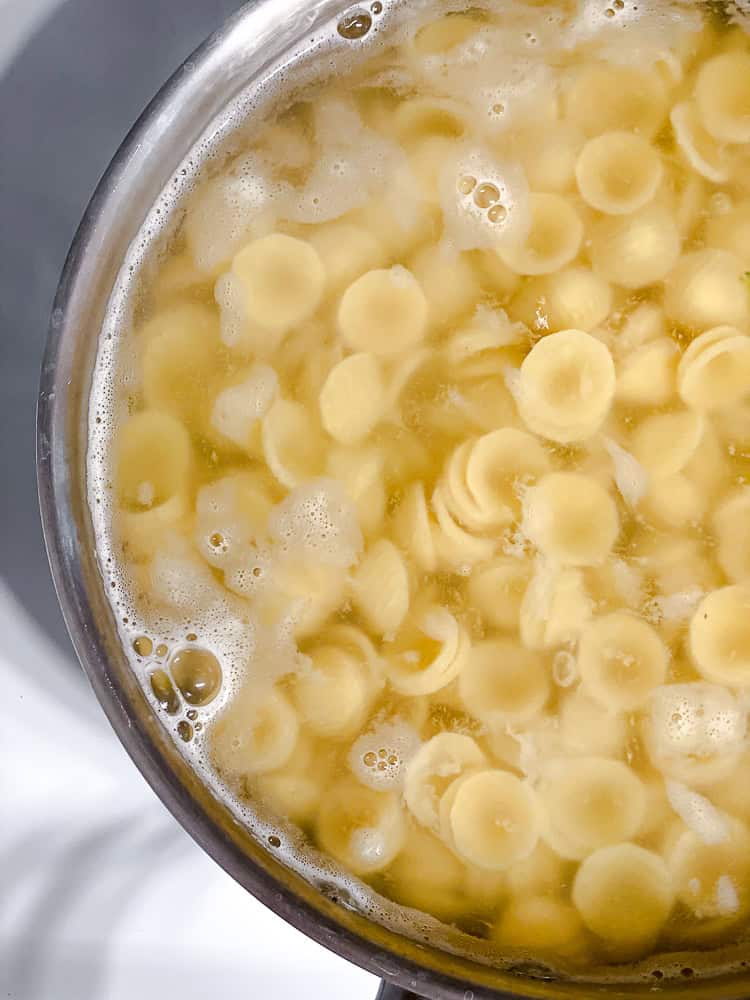 process shot showing pasta cooking in pan