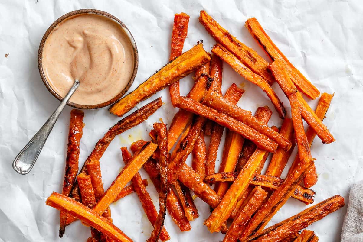 completed Carrot Fries scattered on a white surface