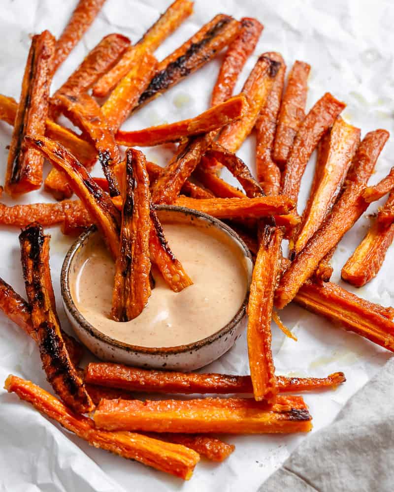 completed Carrot Fries scattered on a white surface