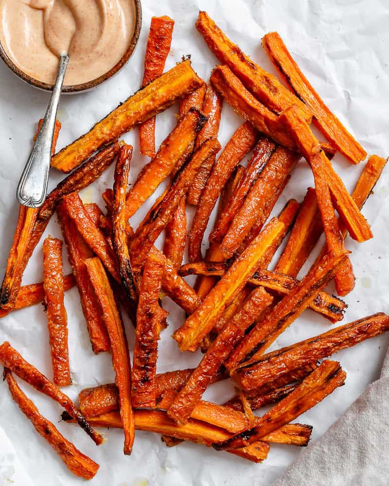 completed Carrot Fries scattered on a white surface