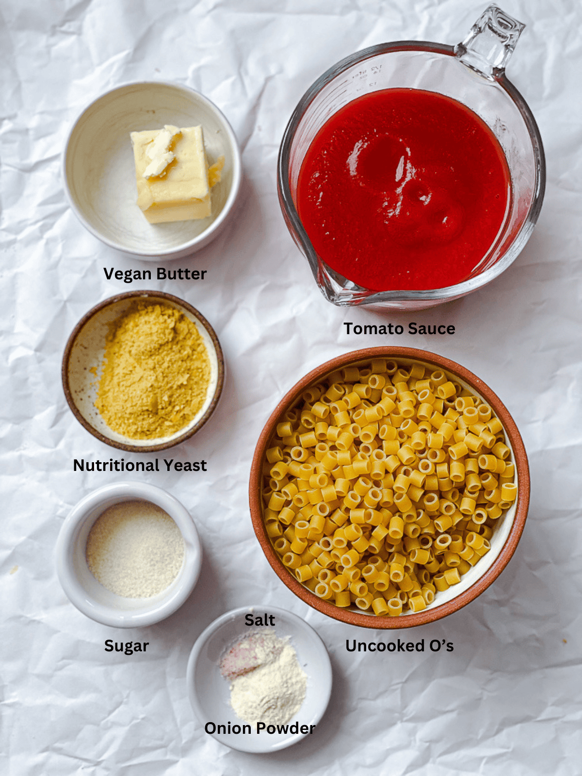 ingredients for Quick Homemade SpaghettiOs measured out on a white surface