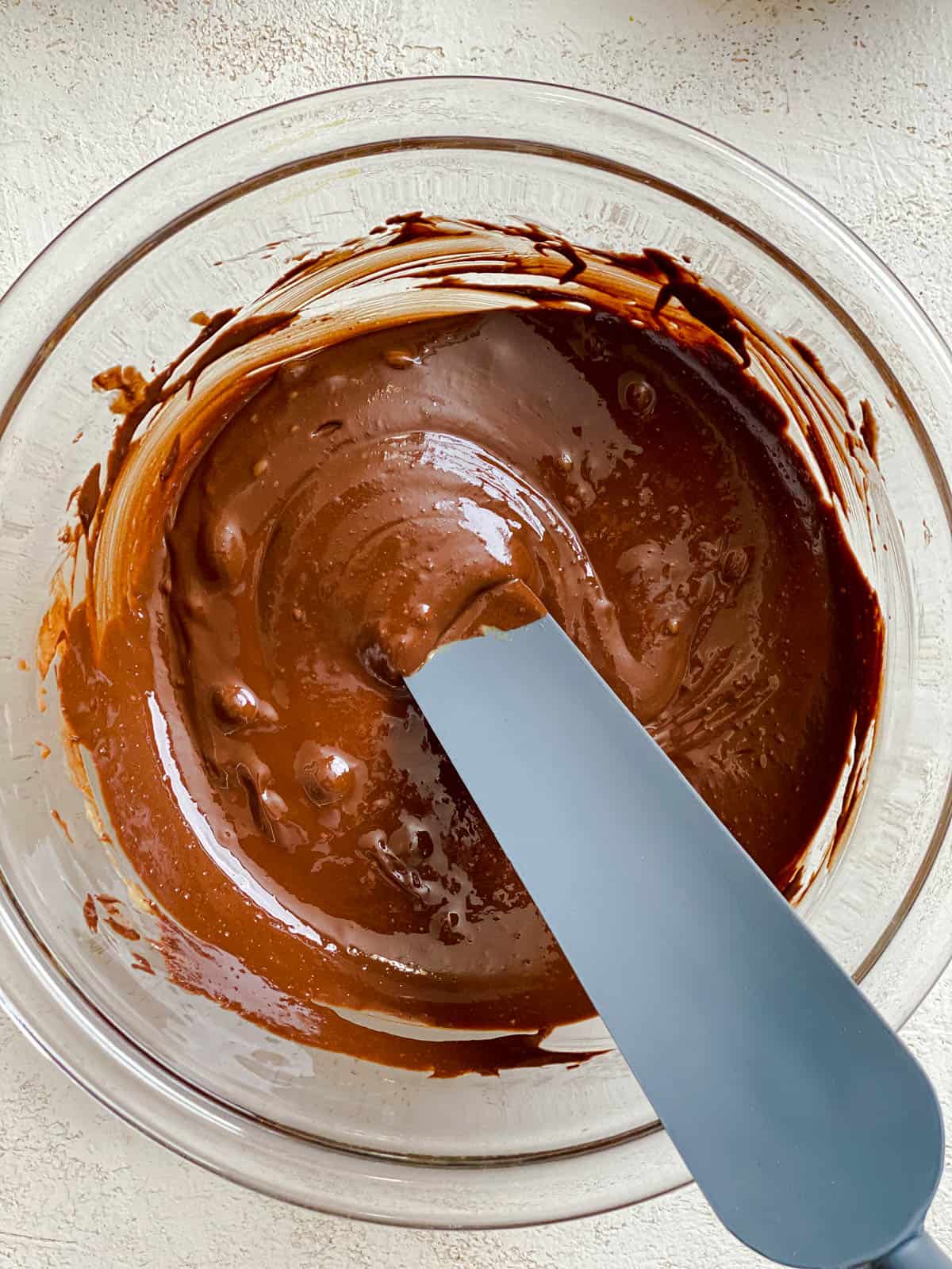 process shot showing stirring chocolate in bowl