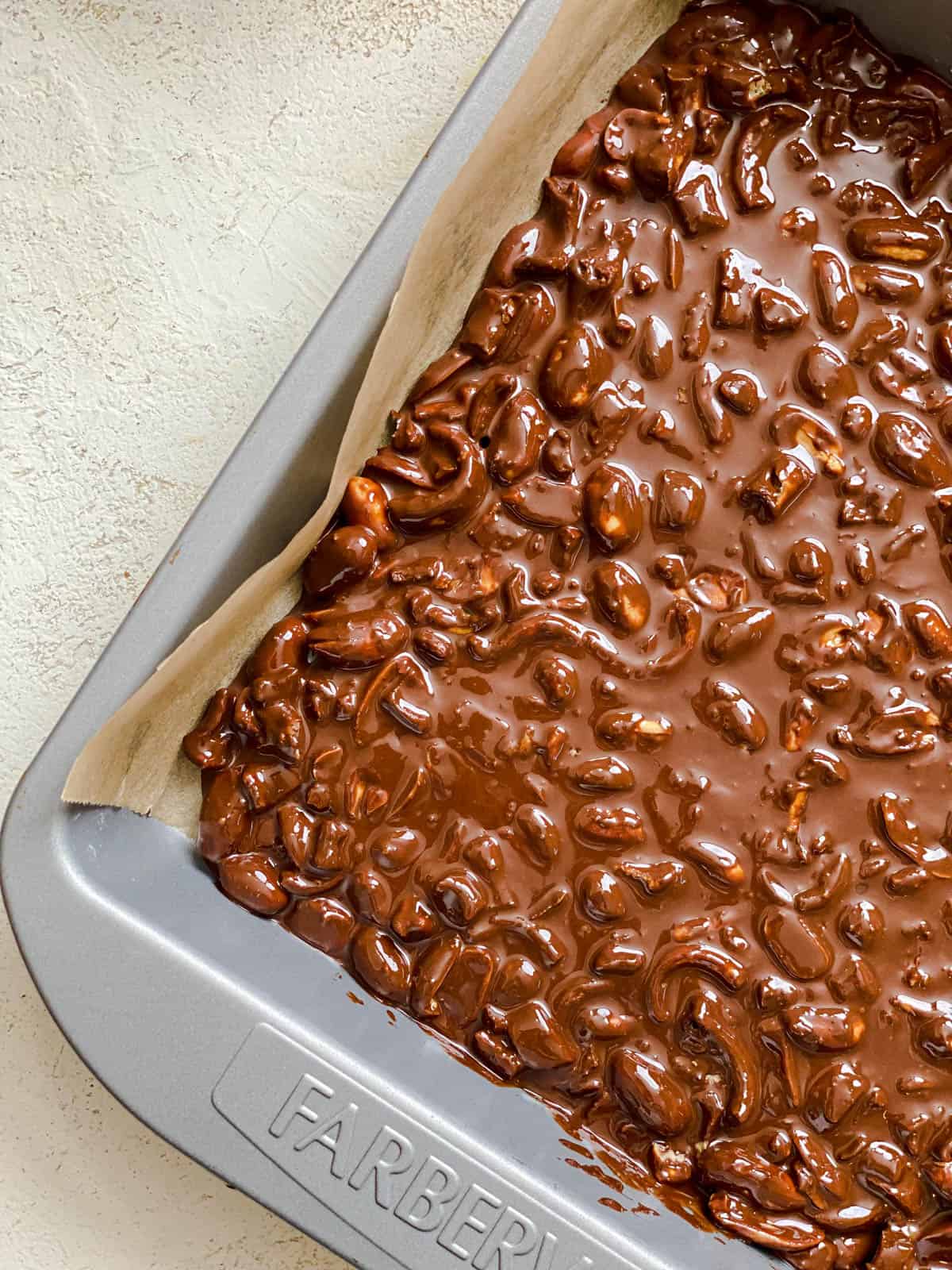 process shot showing chocolate mixture pre-frozen in baking pan