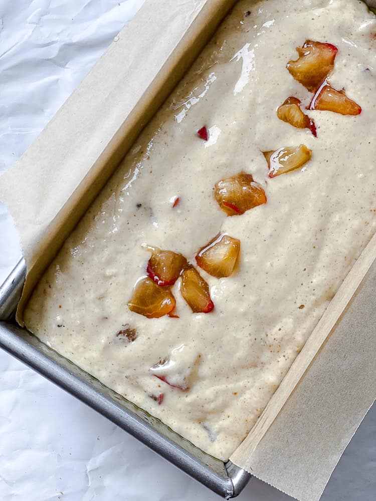 process shot showing batter added to bread pan
