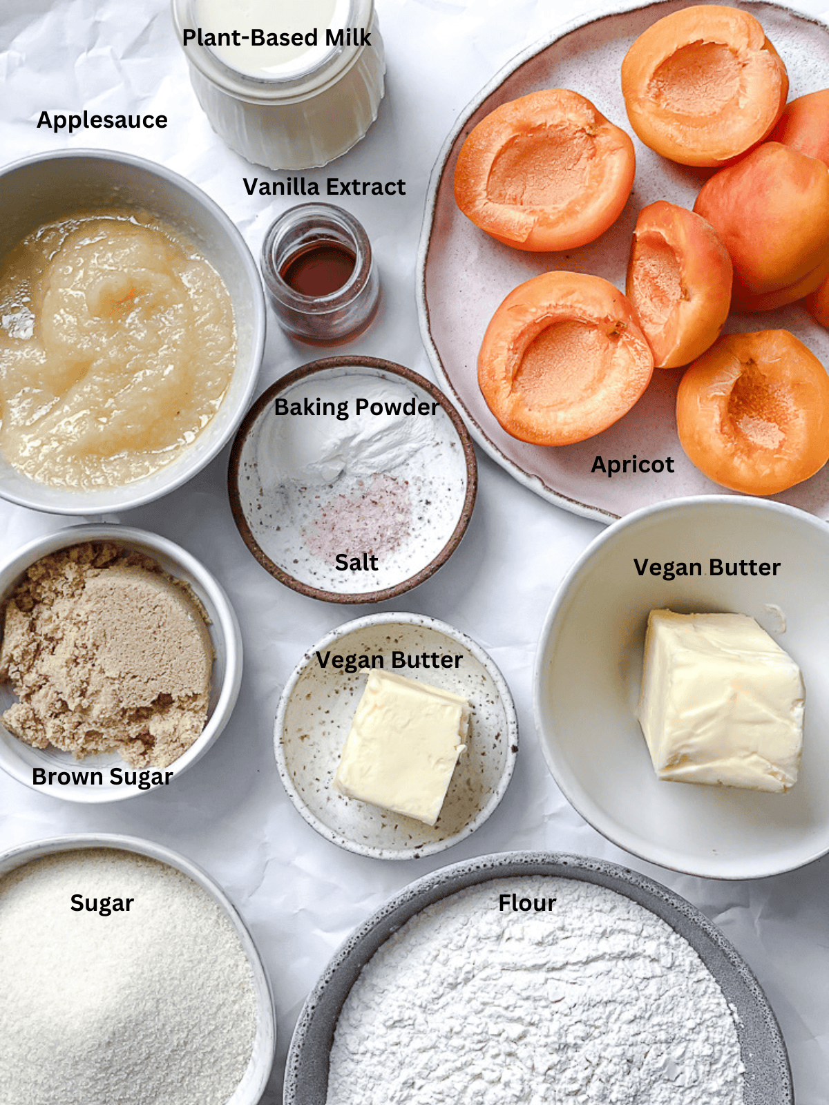 ingredients for Apricot Upside Down Cake measured out on a white surface