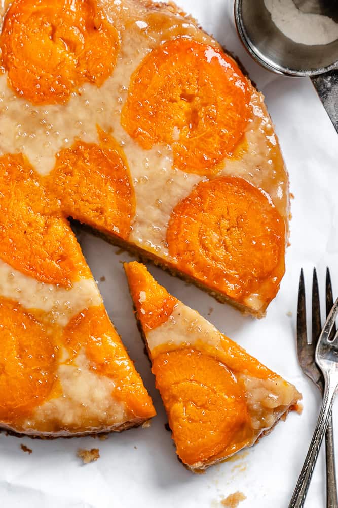 completed Apricot Upside Down Cake on a white surface