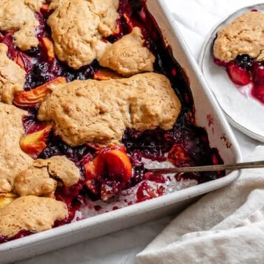 completed Peach and Blueberry Cobbler in baking dish