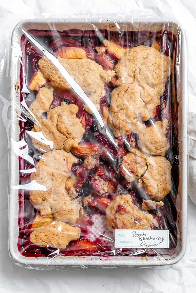 completed Peach and Blueberry Cobbler in storage container