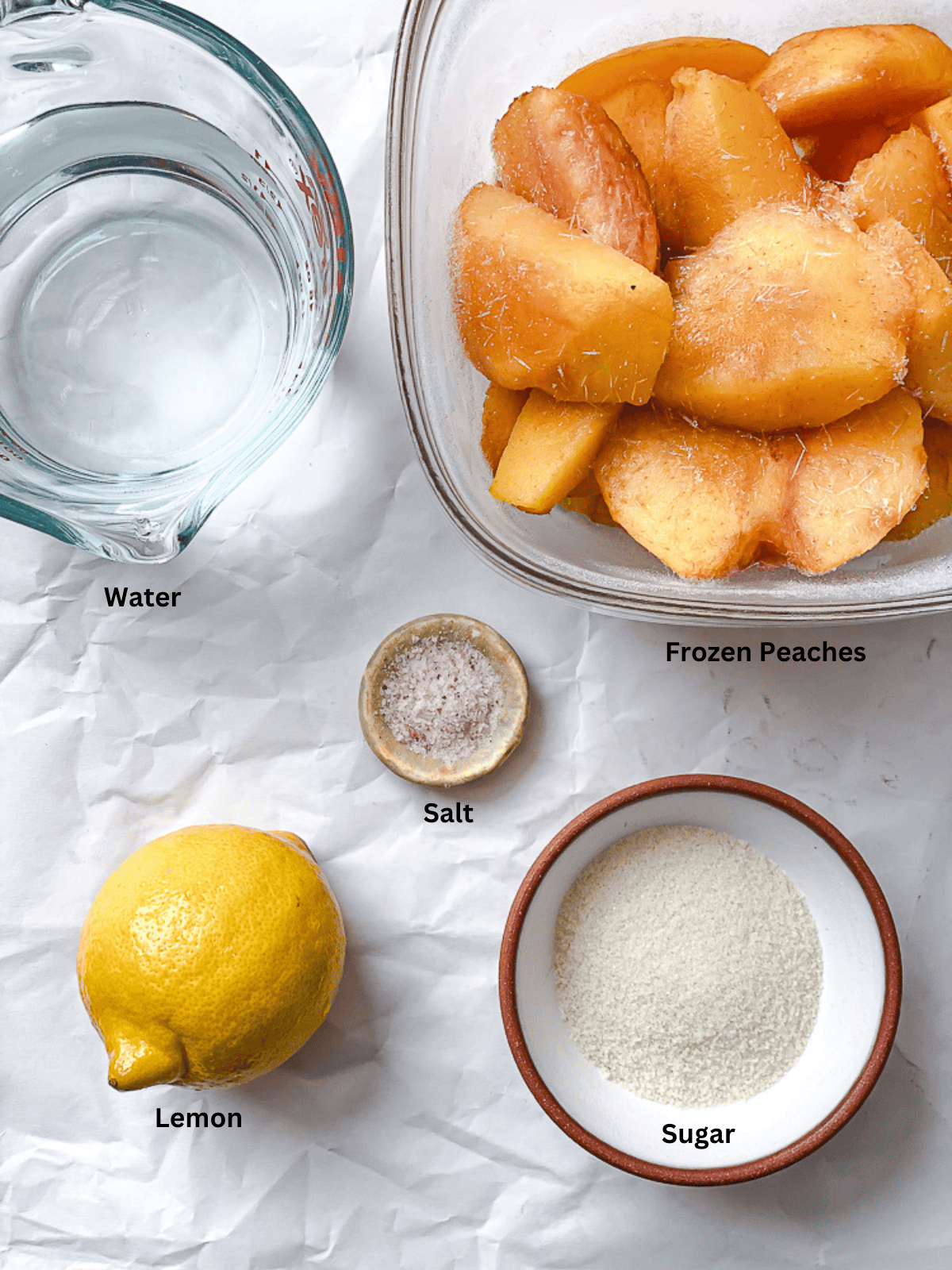 ingredients for peach sorbet in individual containers with labels.