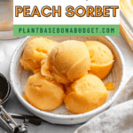 pinterest image of scoops of peach sorbet in a white bowl.