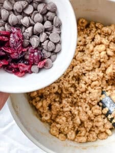 process shot showing ingredients being added to bowl
