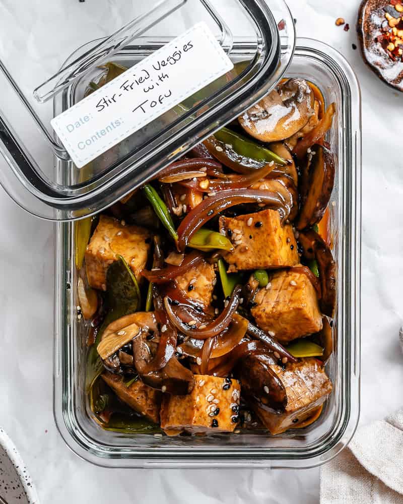 completed Stir-Fried Veggies With Tofu in a storage container