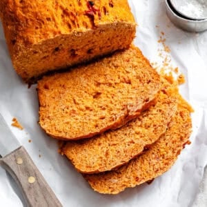completed Tomato Bread sliced on white surface