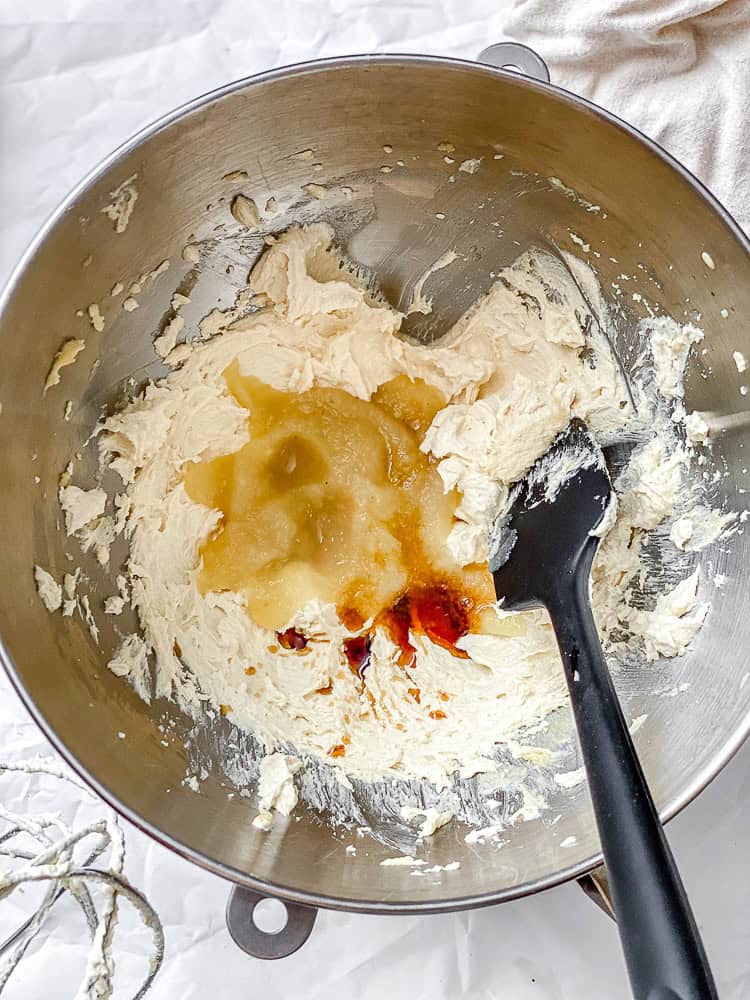 process shot of mixing ingredients together in a bowl