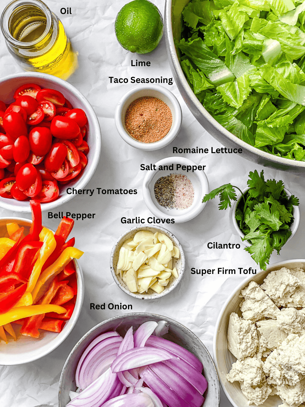 ingredients for Fajita Salad [With Tofu] measured out on a white surface