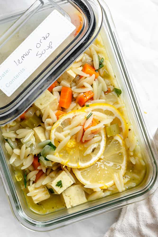 completed Lemon Orzo Soup in a storage container