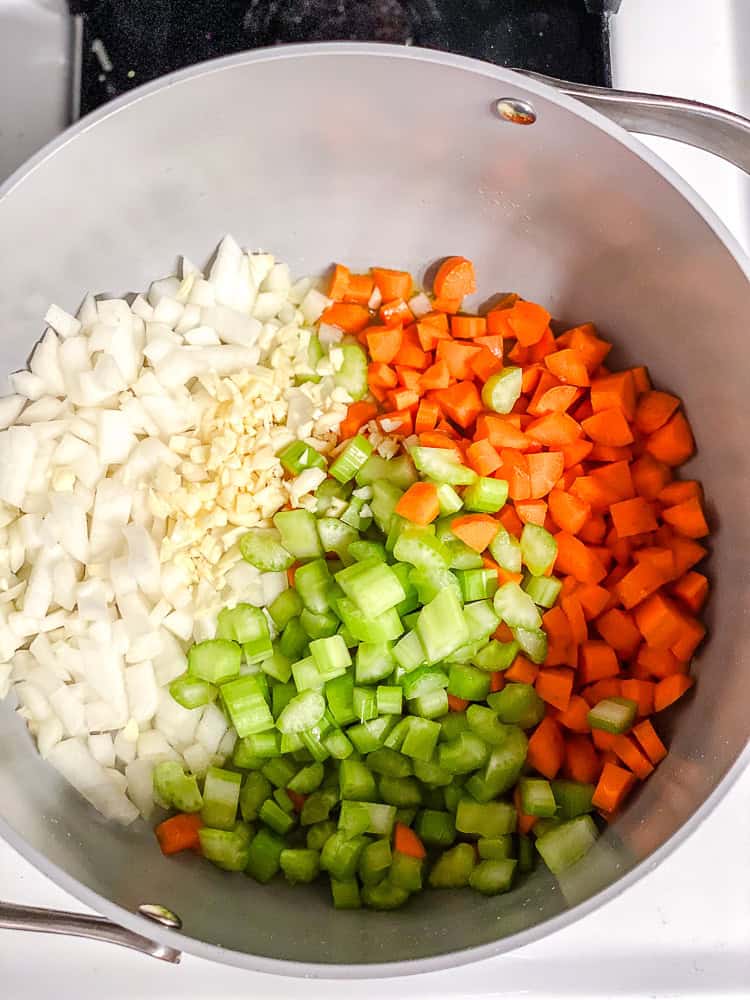 process shot showing veggies in pot