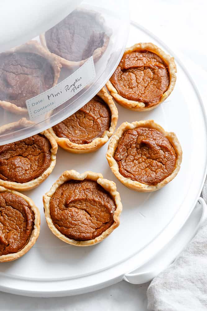 completed Mini Pumpkin Pies in storage container