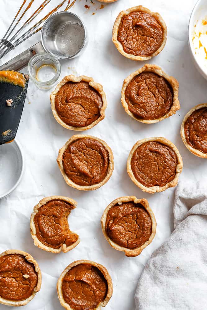 completed Mini Pumpkin Pies on a white surface